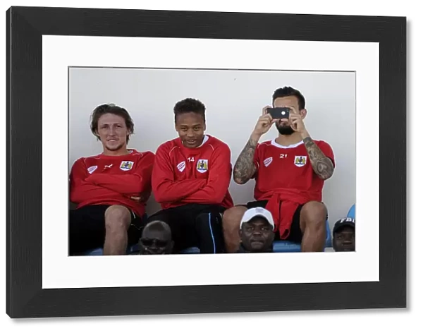 Bristol City Players Bobby Reid, Luke Ayling, and Marlon Pack Watching Extension Gunners vs. Bristol City Match in Gaborone, 2014