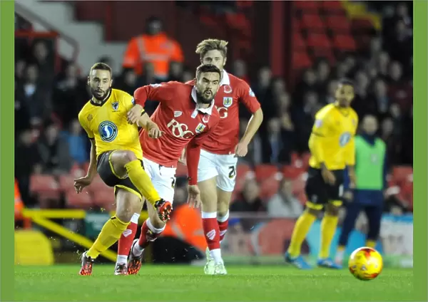 Marlon Pack of Bristol City Closes Down Sammy Moore of AFC Wimbledon during Johnstone's Paint Trophy Match