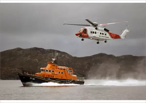 Mallaig severn class lifeboat Henry Alston Hewat 17-26 during a training exercise with Coastguard helicopter