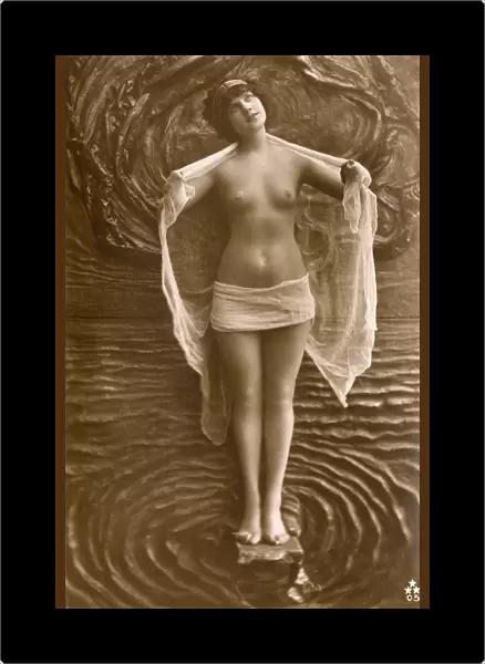 Artistic Italian nude standing amid stylised watery backdrop