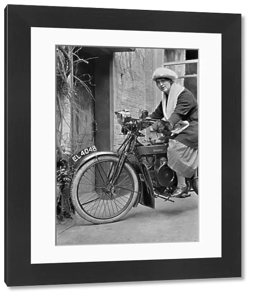 Woman on a Douglas motorbike