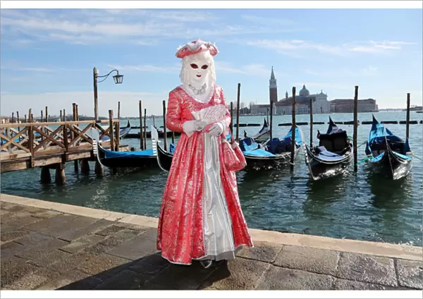 Woman wearing Venice Carnival Costume and Gondolas