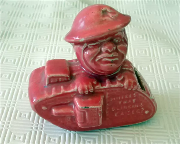 Old Bill Pink glazed money box in the form of a WW1 tank