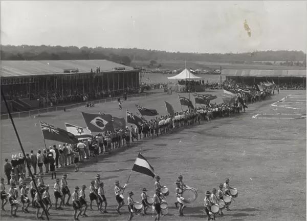 Dutch boy scouts on a parade ground with flags