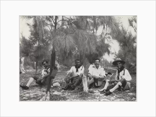 Boy scouts relaxing under a tree, Mauritius