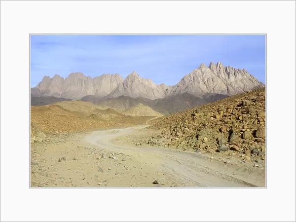 Egypt - road winds in rocks in Arabian desert
