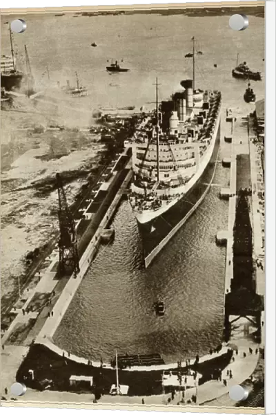 Queen Mary Ocean Liner, entering dry dock at Southampton