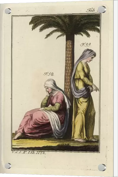 Two Jewish women under a palm tree