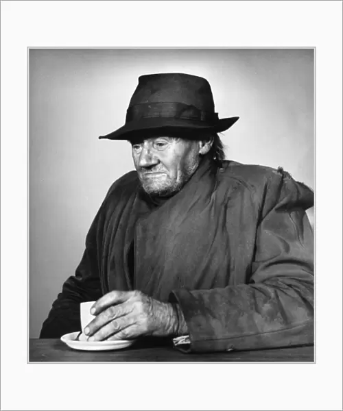 Old man with cup of tea, Balham, SW London