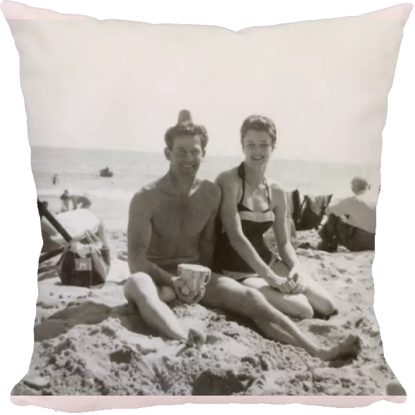 Couple on the beach at Bournemouth - early 1960s