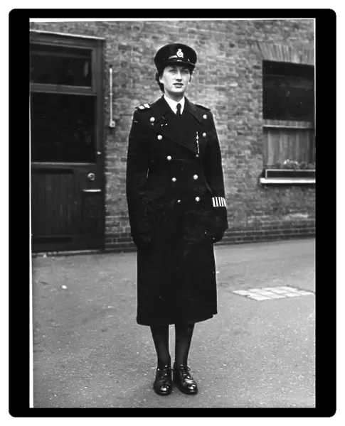 Woman police officer in Bather uniform, London