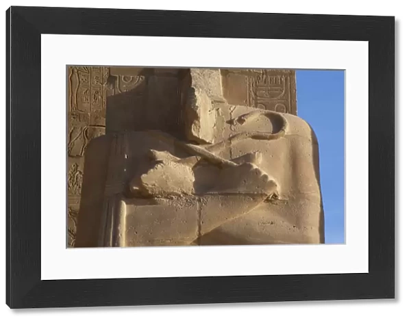 Rameseum. Pillars with osirian statues. Detail. Egypt