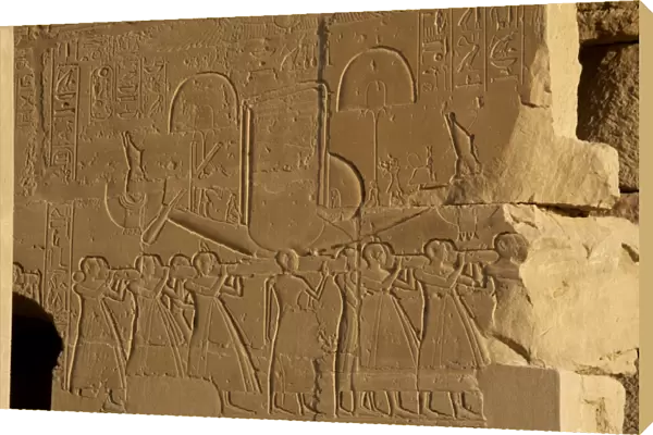 Sacred solar boat carried by priests. Relief. Ramesseum. Egy