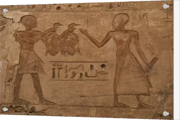 Temple of Ramses III. Two priests with shaved heads. One of t