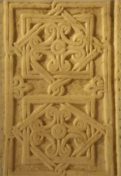 Marble slab decorated with geometric designs and filigree. C