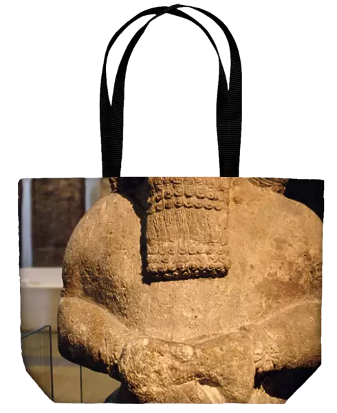 Assyrian figure of an attendant god. Nimrud