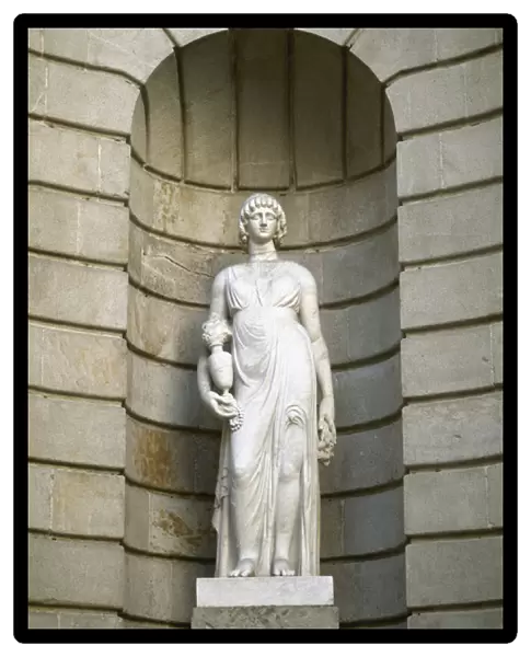 Spain. Barcelona. Statue of the Llotja representing Asia by