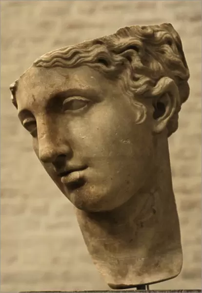 Detail of a head of the statue of a goddess. Roman copy