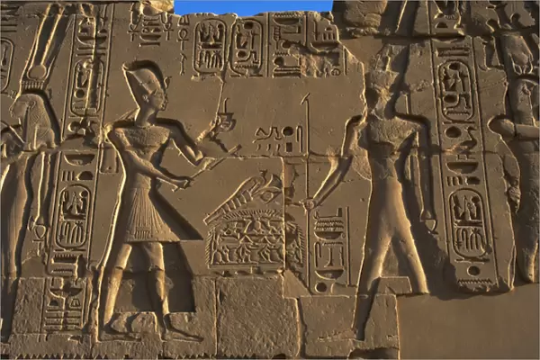 Egyptian Art. Karnak. The Pharaoh Ramesses II carrying an of
