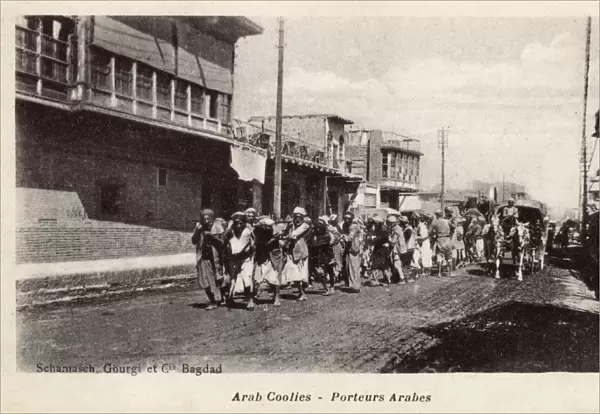 Arab porters in Main Street, Baghdad, Iraq