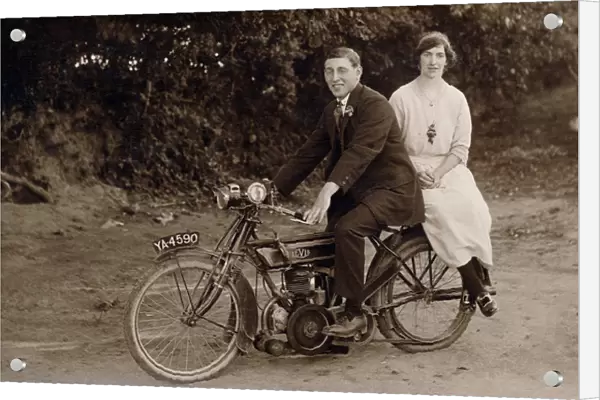 Gentleman & lady on their 1918 Levis motorcycle