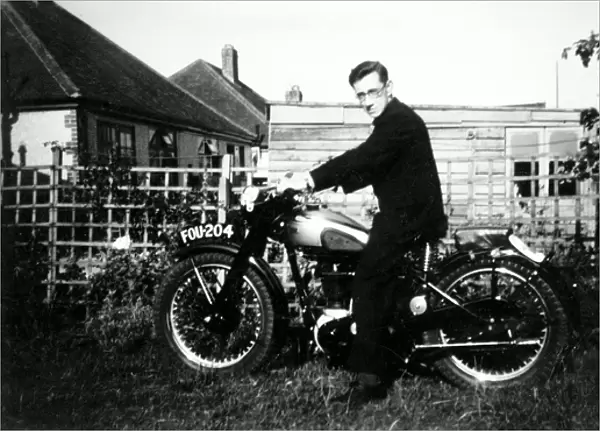 Man on a 1951 BSA Gold Star motorcycle