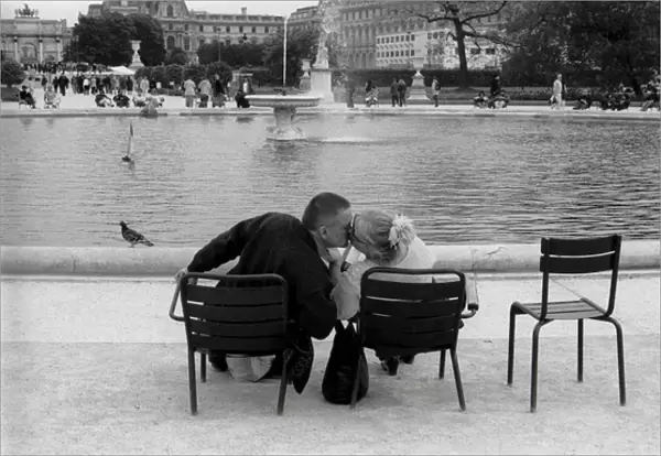 Kissing couple in a park, Paris, France