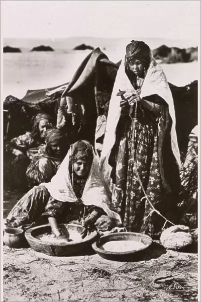 Algeria - Nomadic Women performing cooking and textile tasks