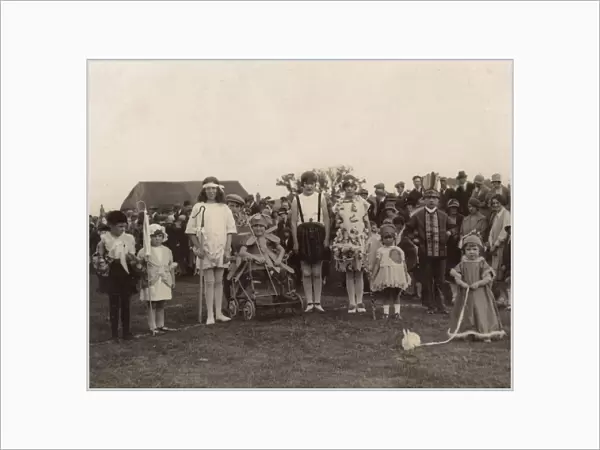 Children in fancy dress at a carnival or fete