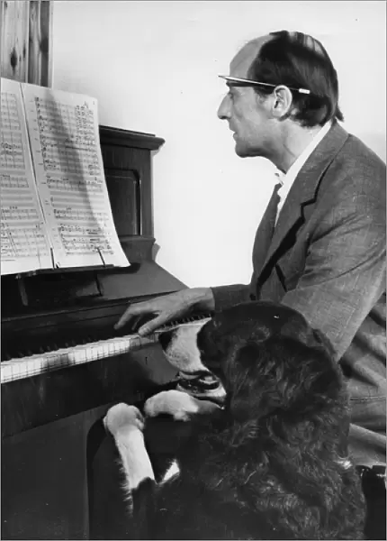 Man and dog at the piano