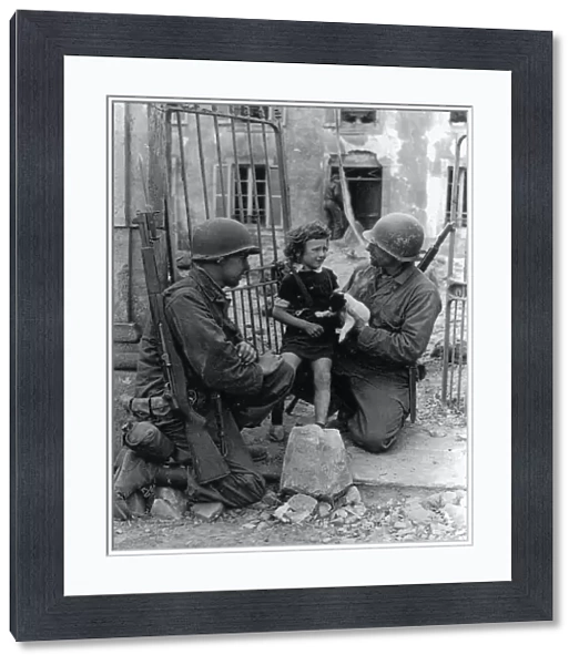 WW2 - US Troops comfort a distressed child and puppy