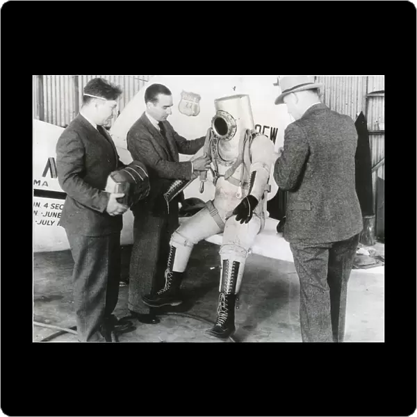 Wiley Post makes a final examination of his pressure suit