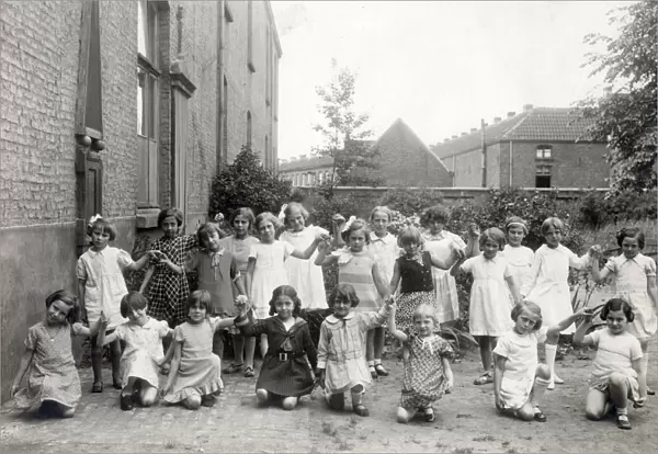 Infant Primary School, England - Schoolgirls in the garden