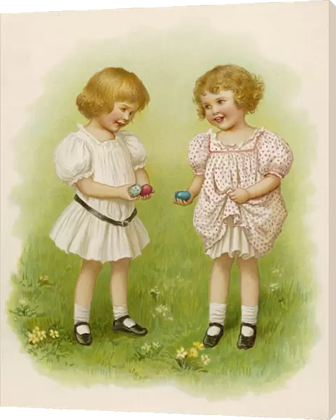 Two little girls with Easter eggs