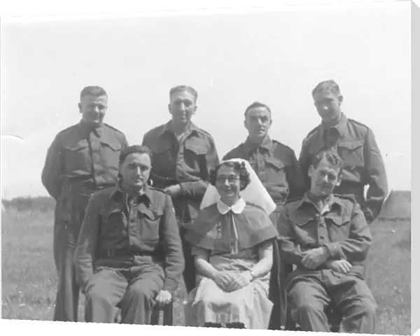 Nurse with group of servicemen