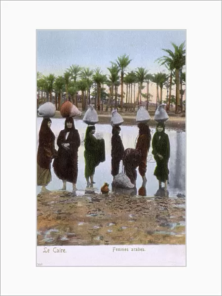 Arab Women carrying large Amphorae - Cairo, Egypt