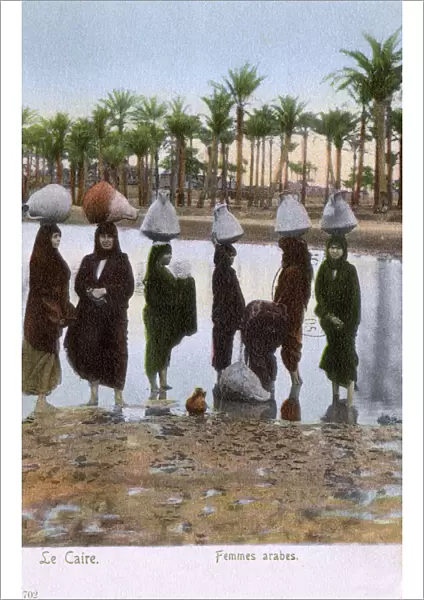 Arab Women carrying large Amphorae - Cairo, Egypt