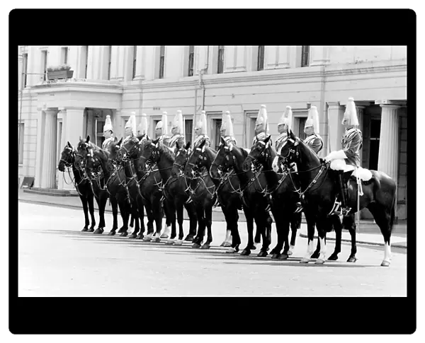 London horseguards on horseback in ceremonial uniform. Date: circa 1960s