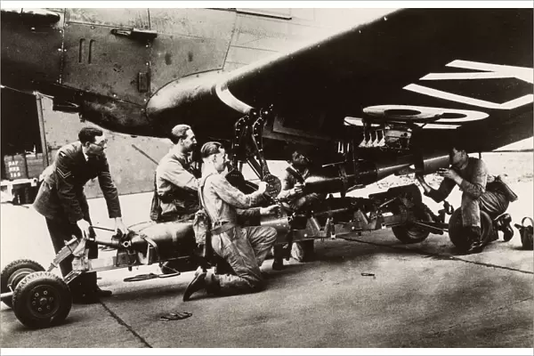 Loading Bombs onto an RAF Bomber prior to a patrol flight