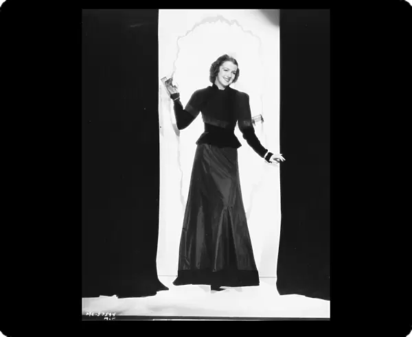 Betty Furness in a smart evening ensemble by Dolly Tree