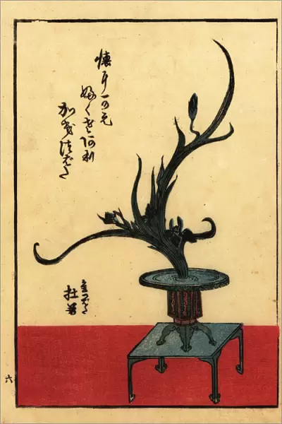 Japanese flower arrangement with leaves and flowers