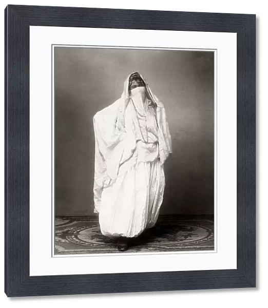 Portrait of veiled woman, North Afrcia, Algeria or Tunisia