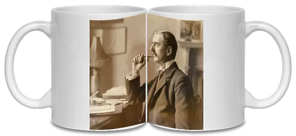 Neville Chamberlain, British politician, at his desk