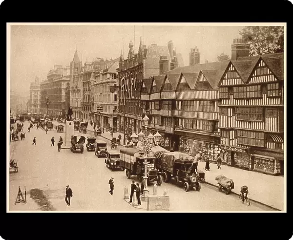 Holborn showing Staple Inn and Roneo an office appliance shop. Date: 1937