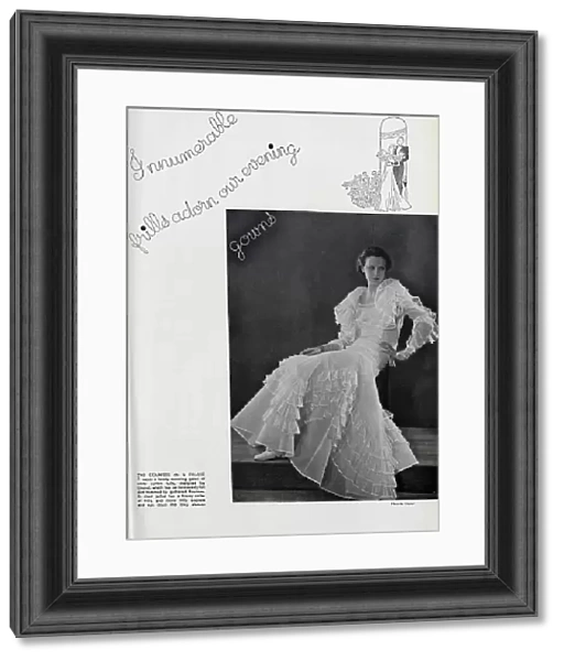 Countess de la Falaise, studio fashion portrait, by Chanel. Captioned, Innumerable frills adorn our evening gowns'. With description, The Countess de la Falaise, wears a lovely evening gown of white cotton tulle, designed by Chanel