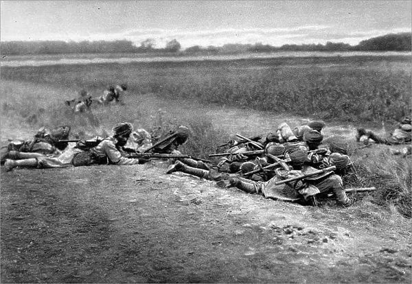 On duty with the allies in France: Indian Infantry taking cover while attacking