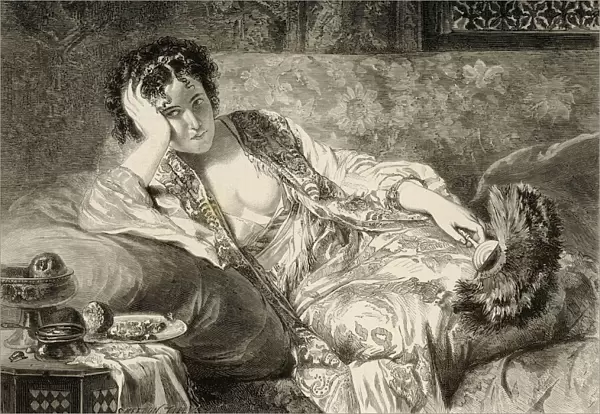 Woman reclining on couch