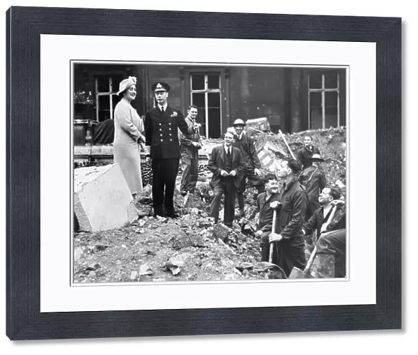 King and Queen inspecting bomb damage at Buckingham Palace