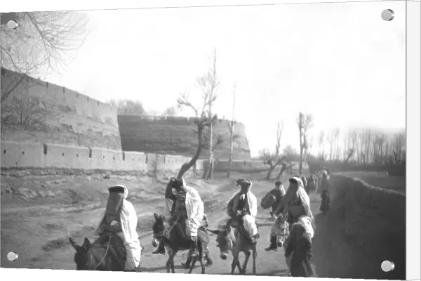 Five people riding donkeys, Kashgar