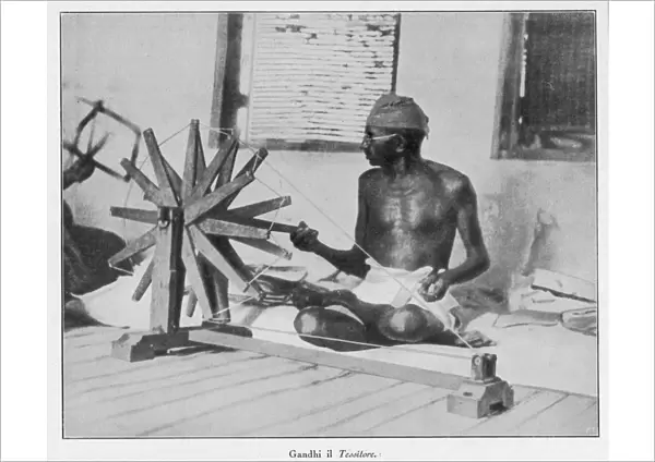 Mahatma Gandhi spinning at his wheel
